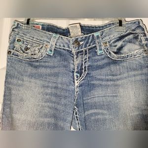 True Religion Julie low rise jeans with white and turquoise details. Size 29